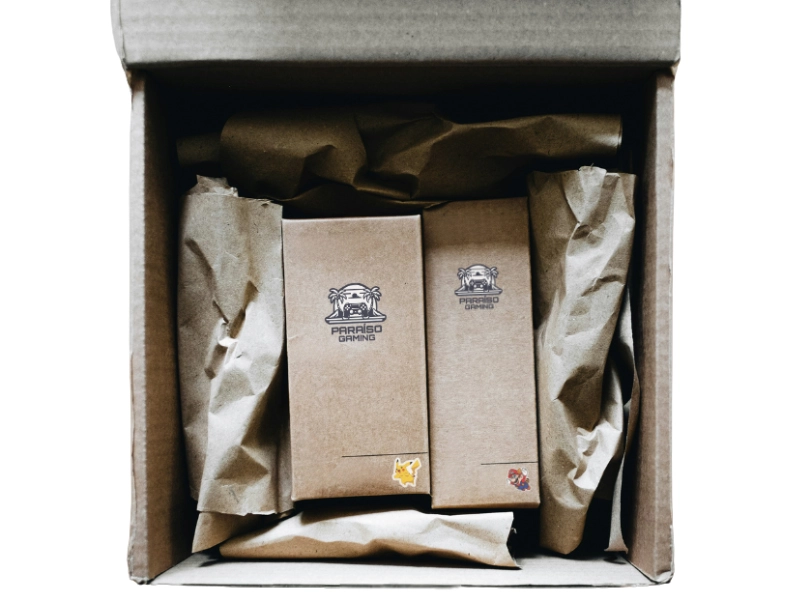 Caja con packaging de Paraíso Gaming personalizada